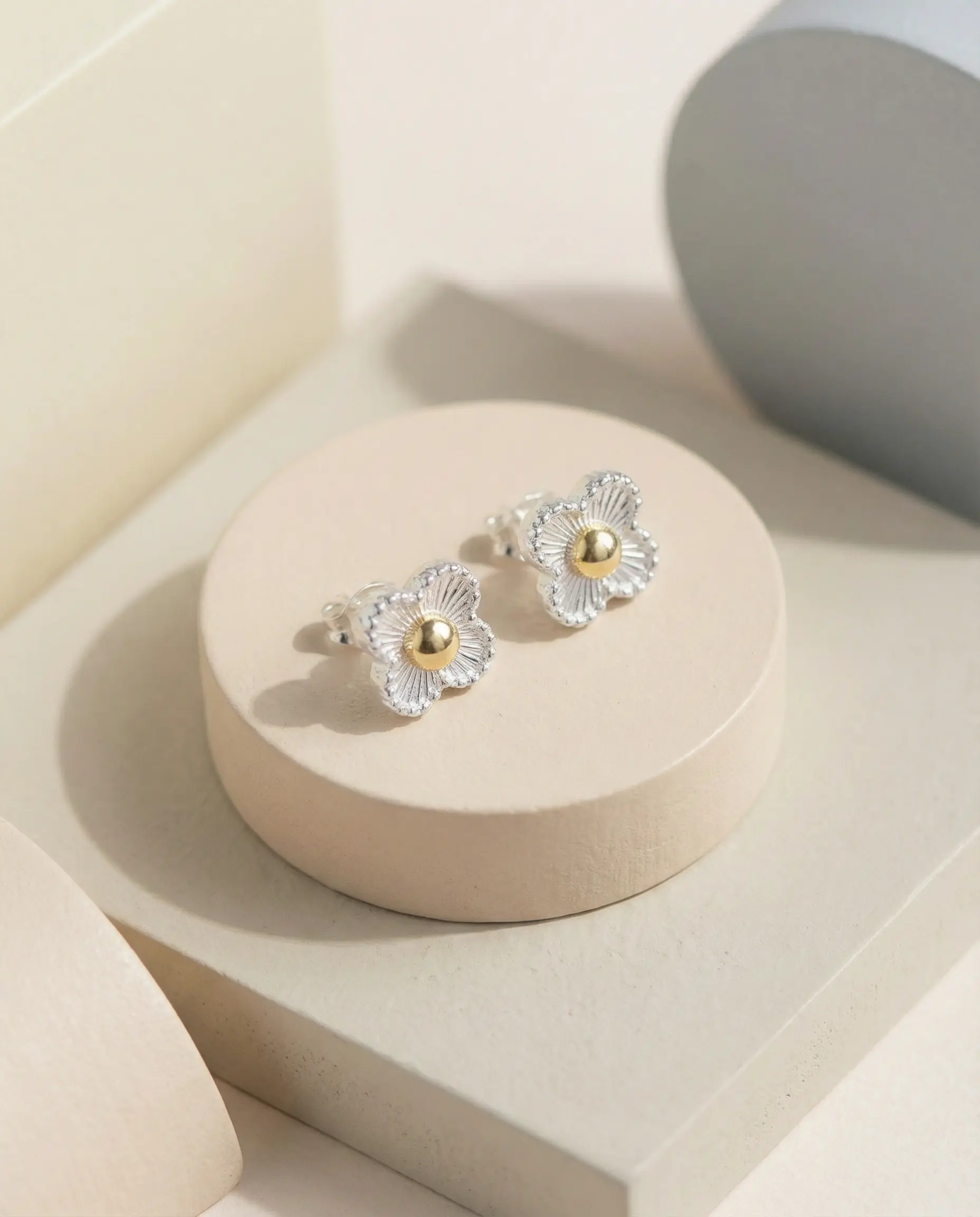 aretes flor